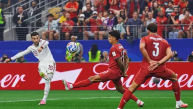 Imagen de los jugadores de Portugal y España en el campo de fútbol