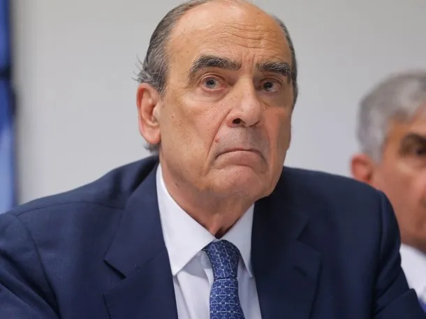 Guillermo Francos y Diego Santilli en una reunión política
