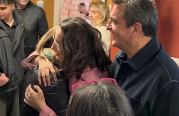 Sergio Massa sonriendo junto a su hija graduada en la UNSAM
